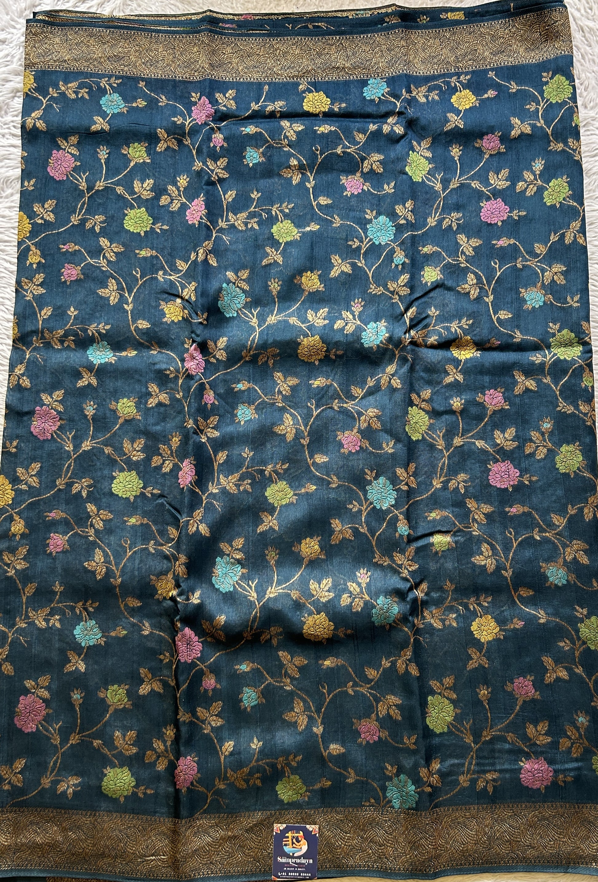 Banarasi Tussar Georgette Allover Saree Peacock Blue Colored Paired with a Zari Border. - Sampradaya Designer Studio