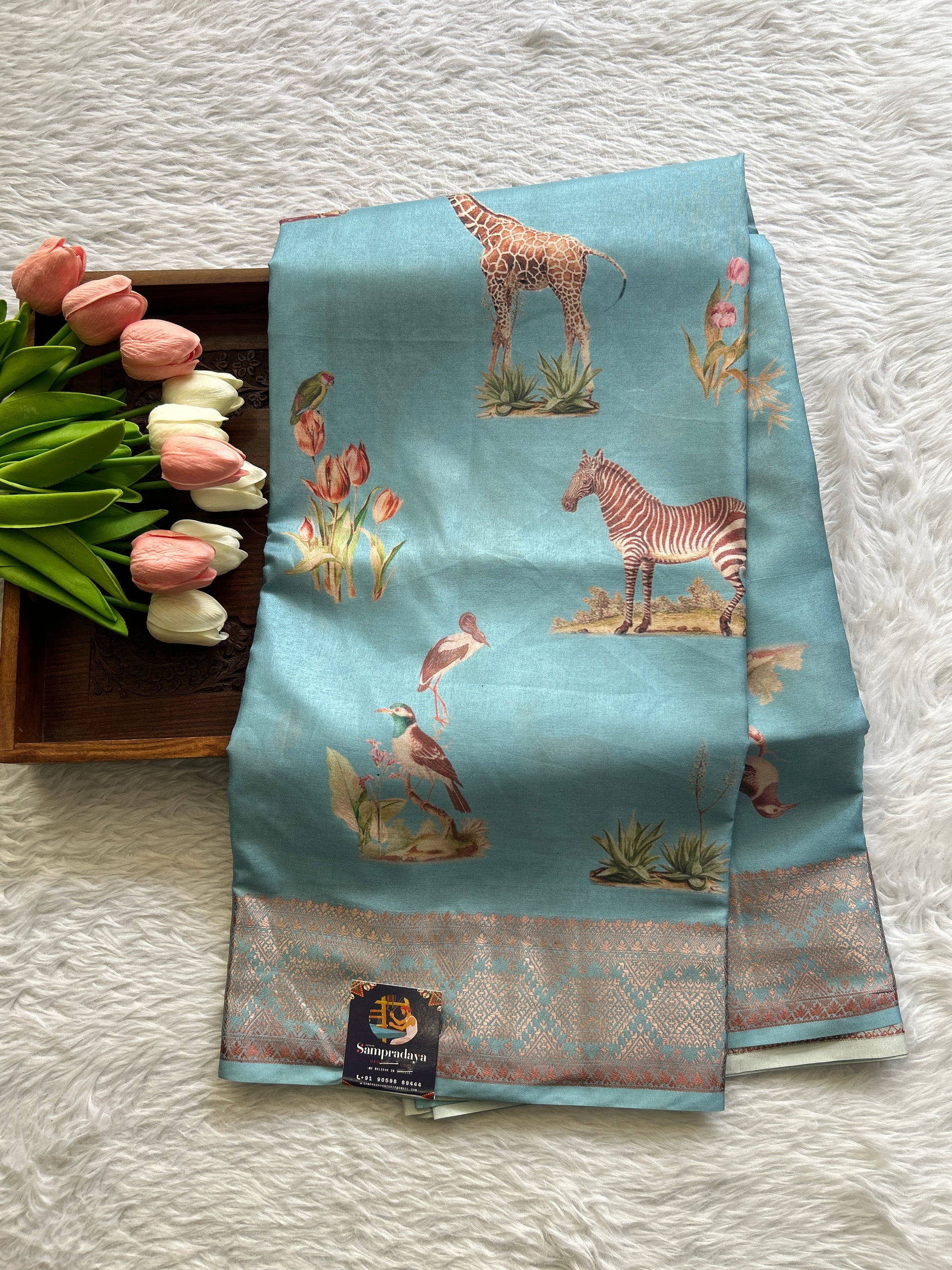 Semi Raw Silk Saree Sky Blue Colored Complemented with a Zari Border. - Sampradaya Designer Studio