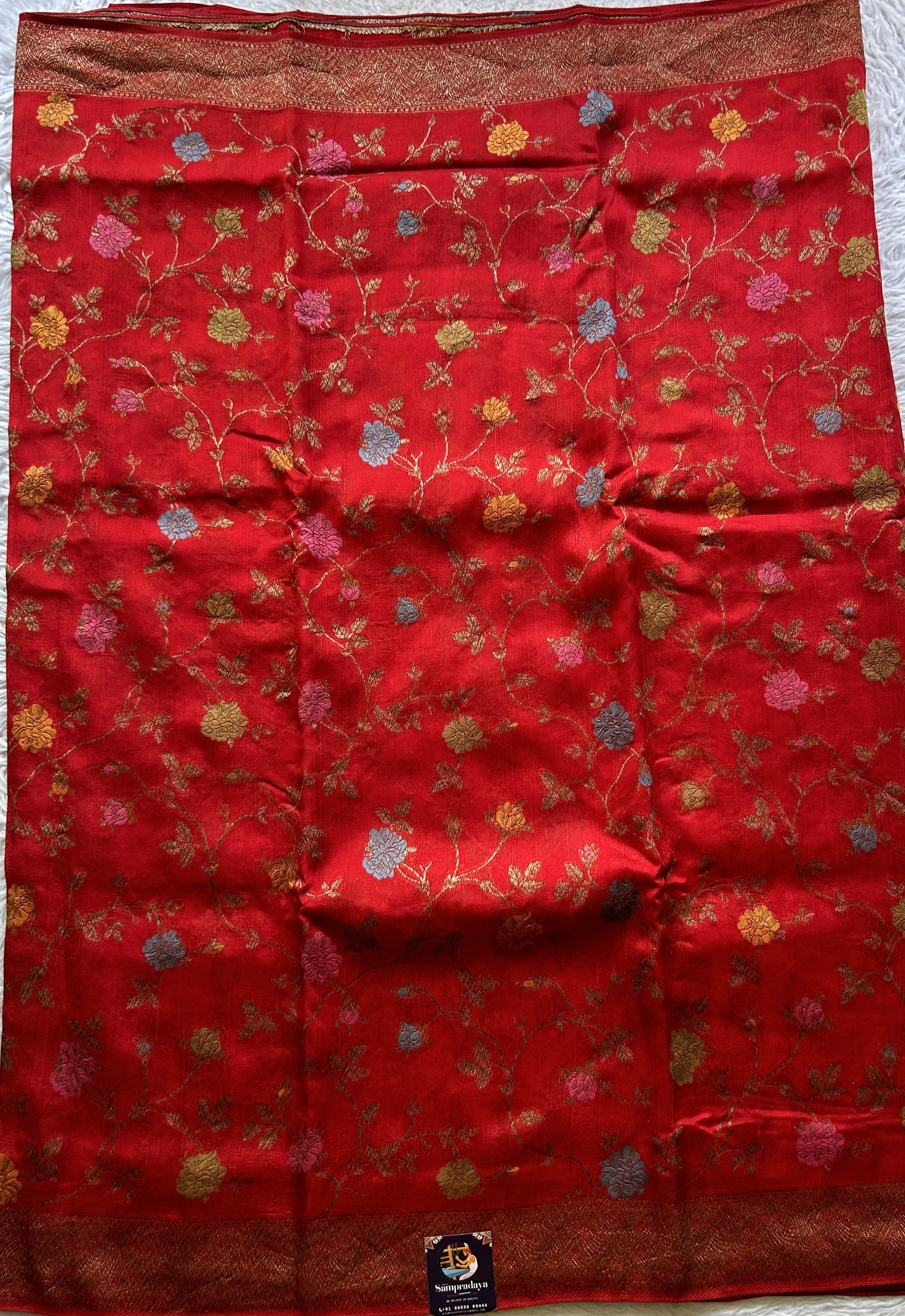 Banarasi Tussar Georgette Allover Saree Red Colored Paired with a Zari Border. - Sampradaya Designer Studio