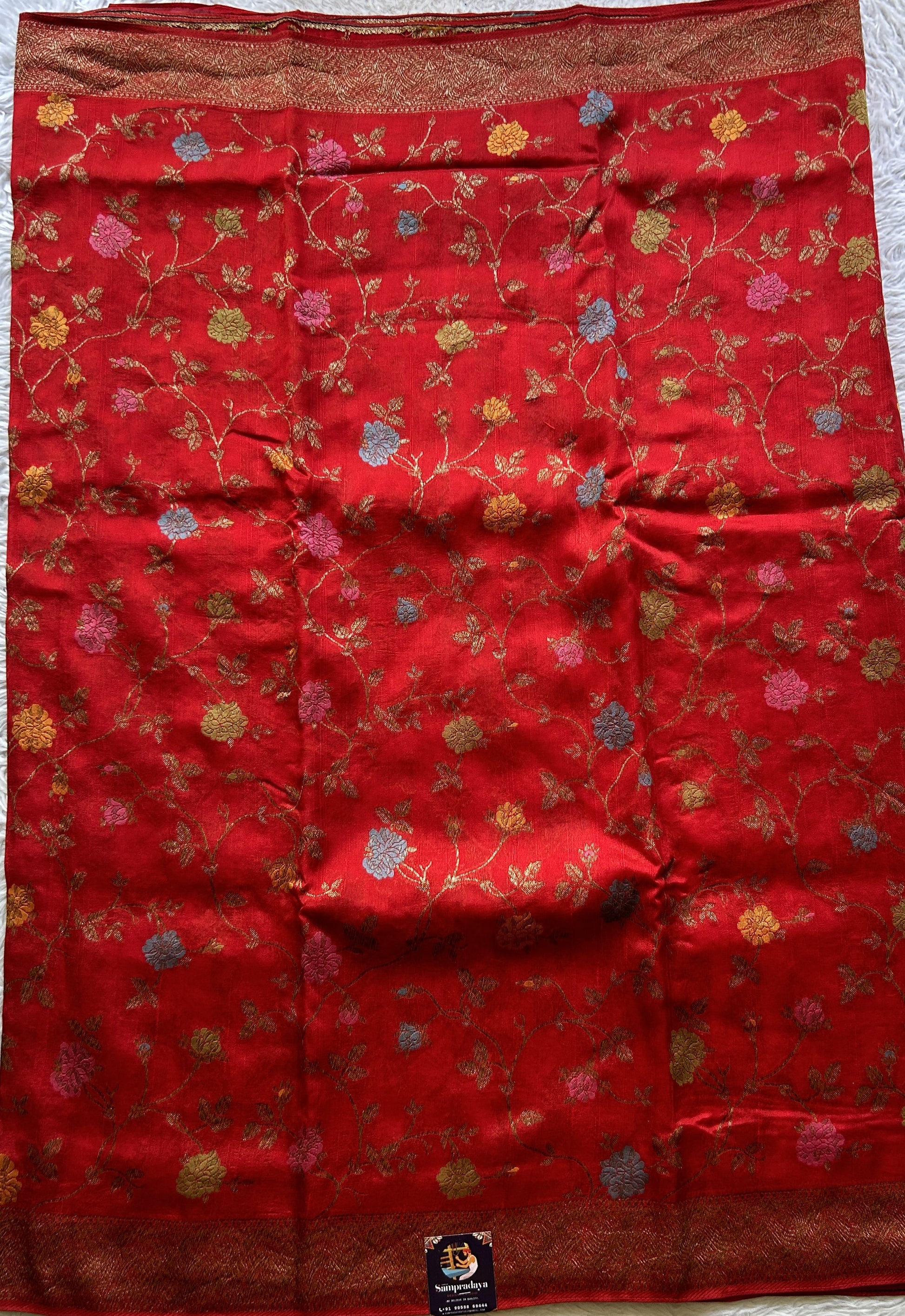 Banarasi Tussar Georgette Allover Saree Red Colored Paired with a Zari Border. - Sampradaya Designer Studio