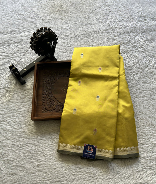 Banarasi Katan Silk Saree Yellow Colored Elegantly Paired with a Zari border. - Sampradaya Designer Studio