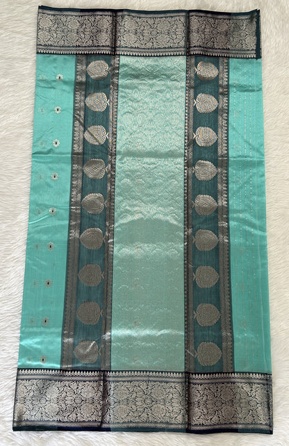 Chanderi Pattu Saree Sea Blue colored saree complemented with a Dark Grey Kanchi Border - Sampradaya Designer Studio