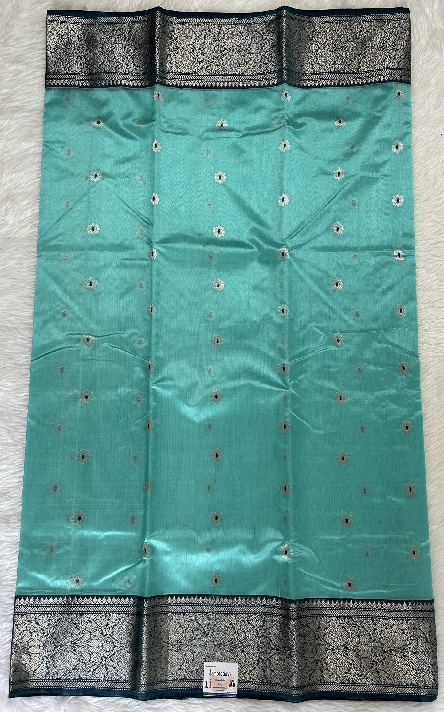 Chanderi Pattu Saree Sea Blue colored saree complemented with a Dark Grey Kanchi Border - Sampradaya Designer Studio