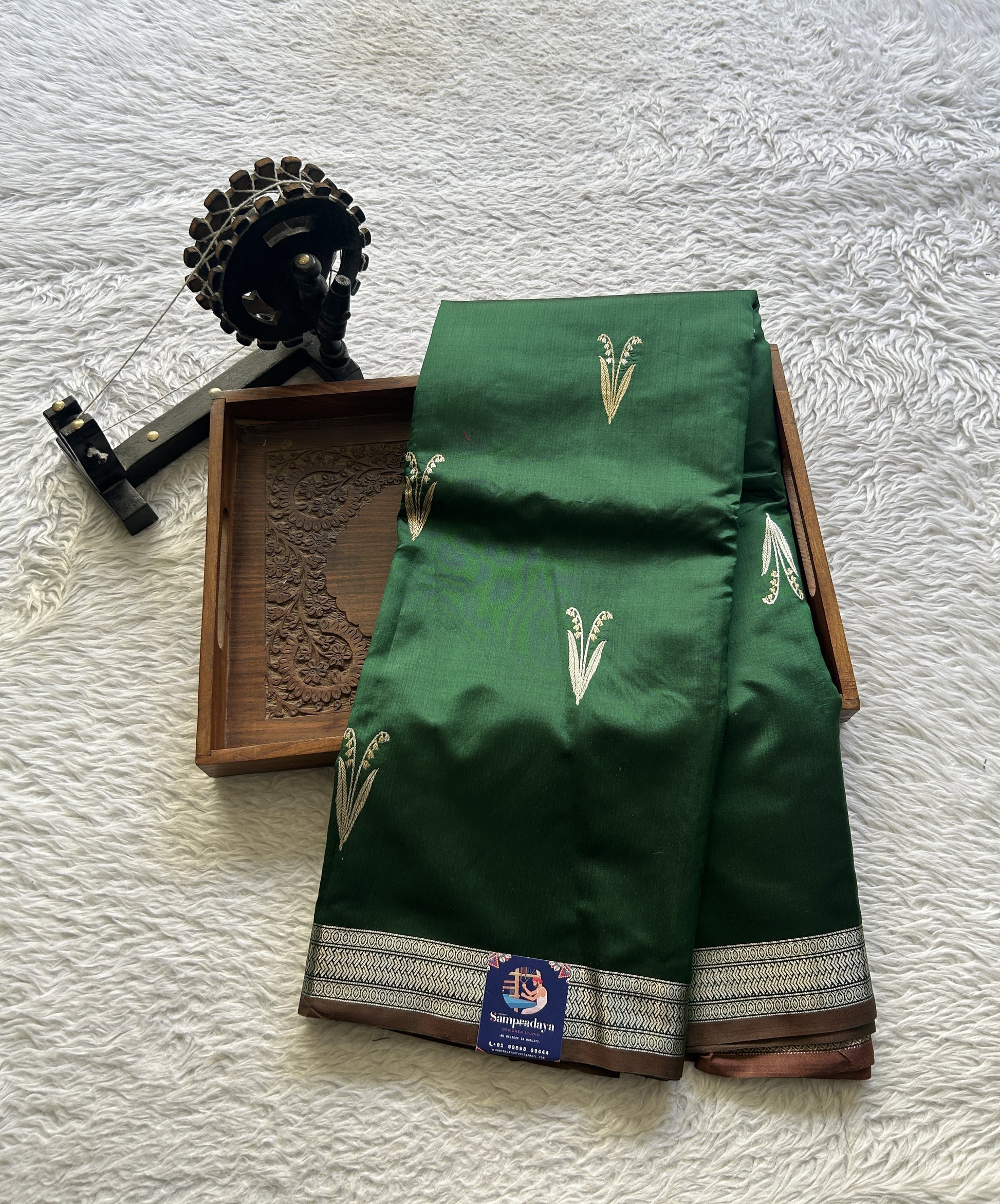 Banarasi Katan Silk Saree Green Colored Elegantly Paired with a Zari border. - Sampradaya Designer Studio