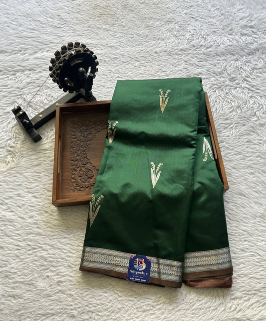Banarasi Katan Silk Saree Green Colored Elegantly Paired with a Zari border. - Sampradaya Designer Studio