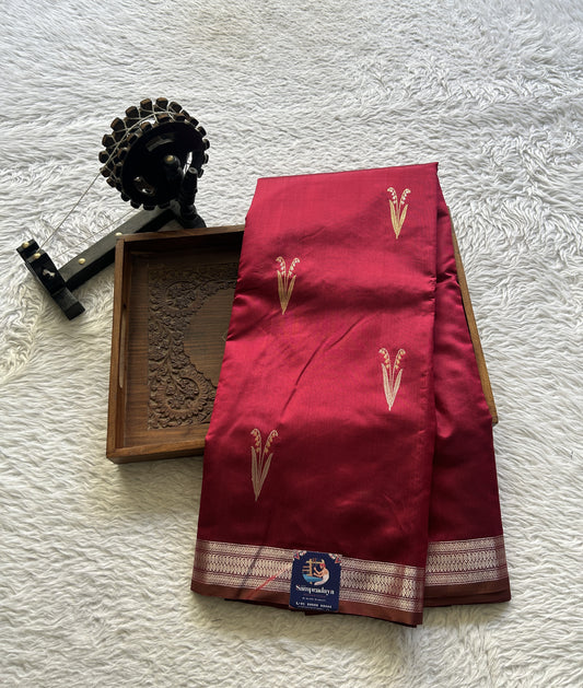 Banarasi Katan Silk Saree Magenta Colored Elegantly Paired with a Zari border. - Sampradaya Designer Studio