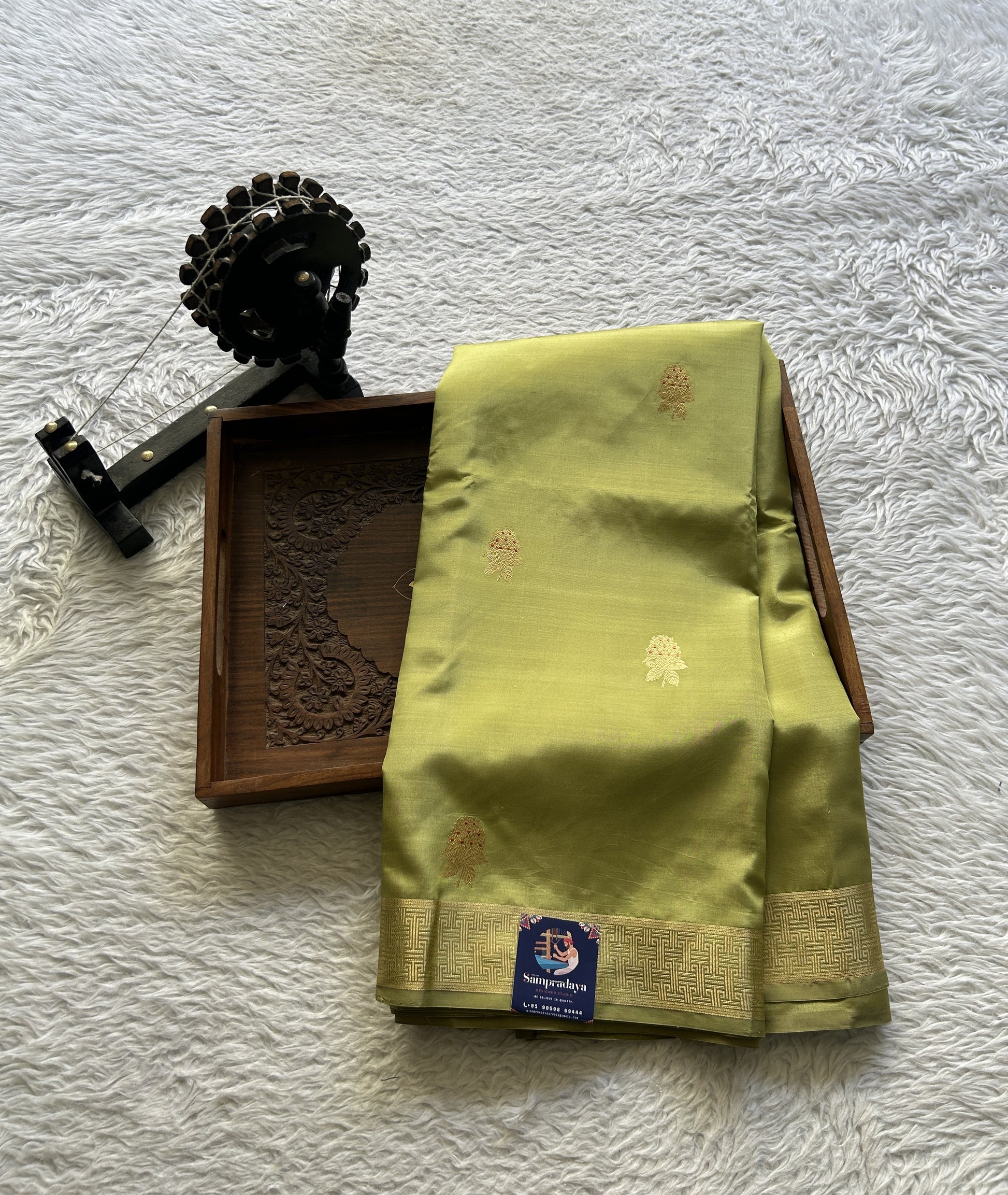 Banarasi Katan Silk Saree Light Olive Green Colored Elegantly Paired with a Zari border. - Sampradaya Designer Studio