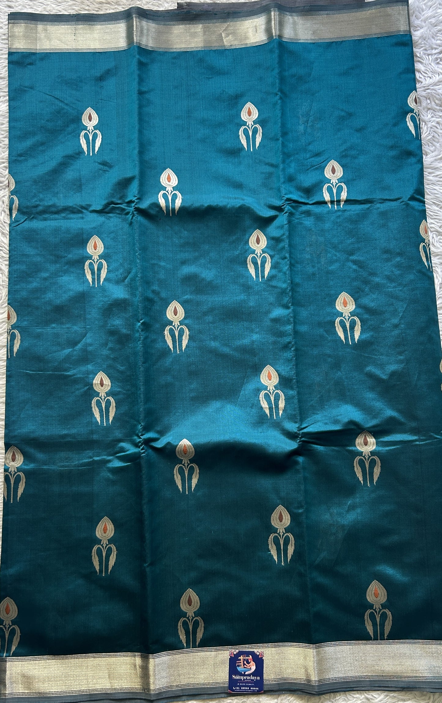 Banarasi Katan Silk Saree Rama Green Colored Elegantly Paired with a Zari border. - Sampradaya Designer Studio