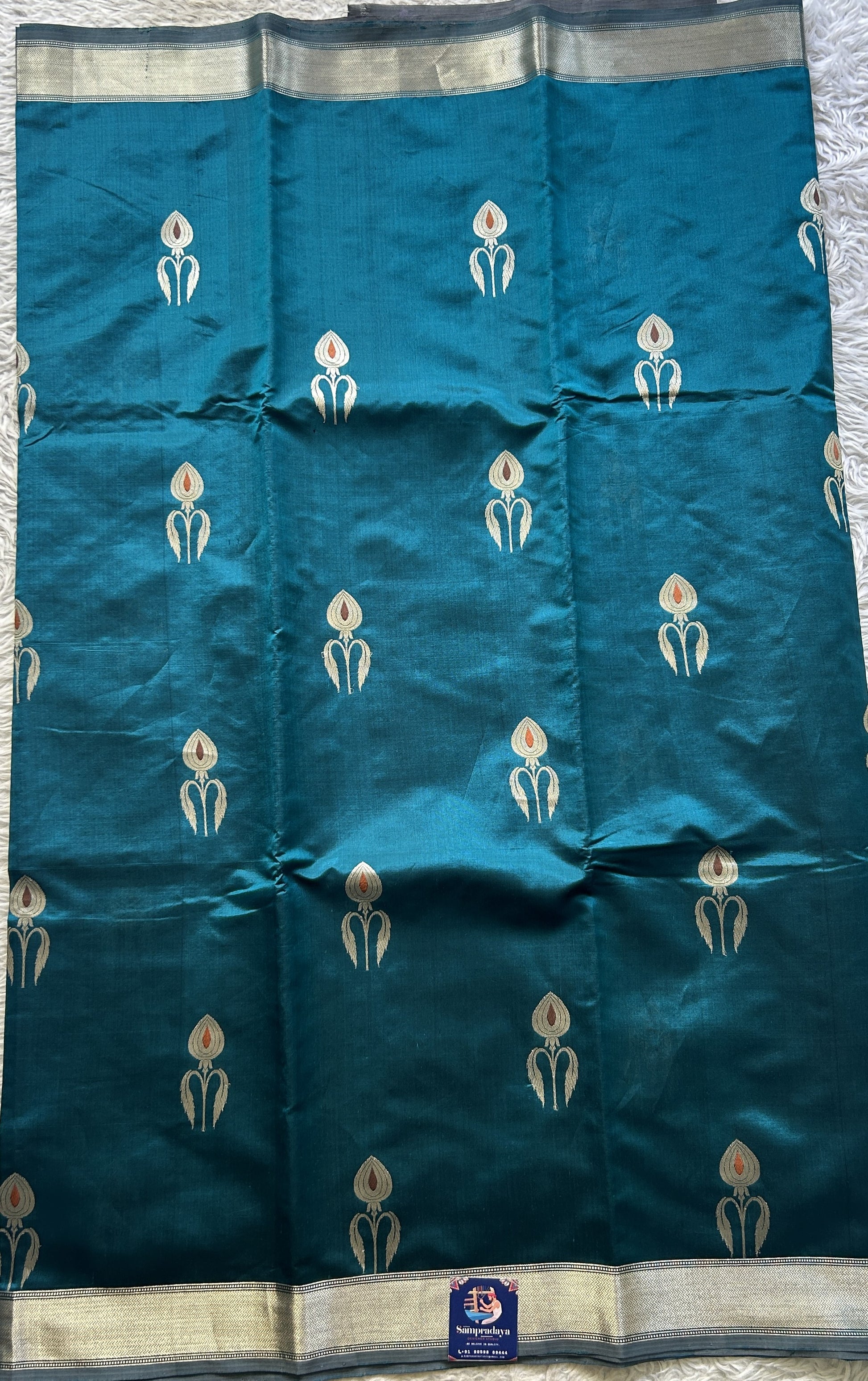 Banarasi Katan Silk Saree Rama Green Colored Elegantly Paired with a Zari border. - Sampradaya Designer Studio