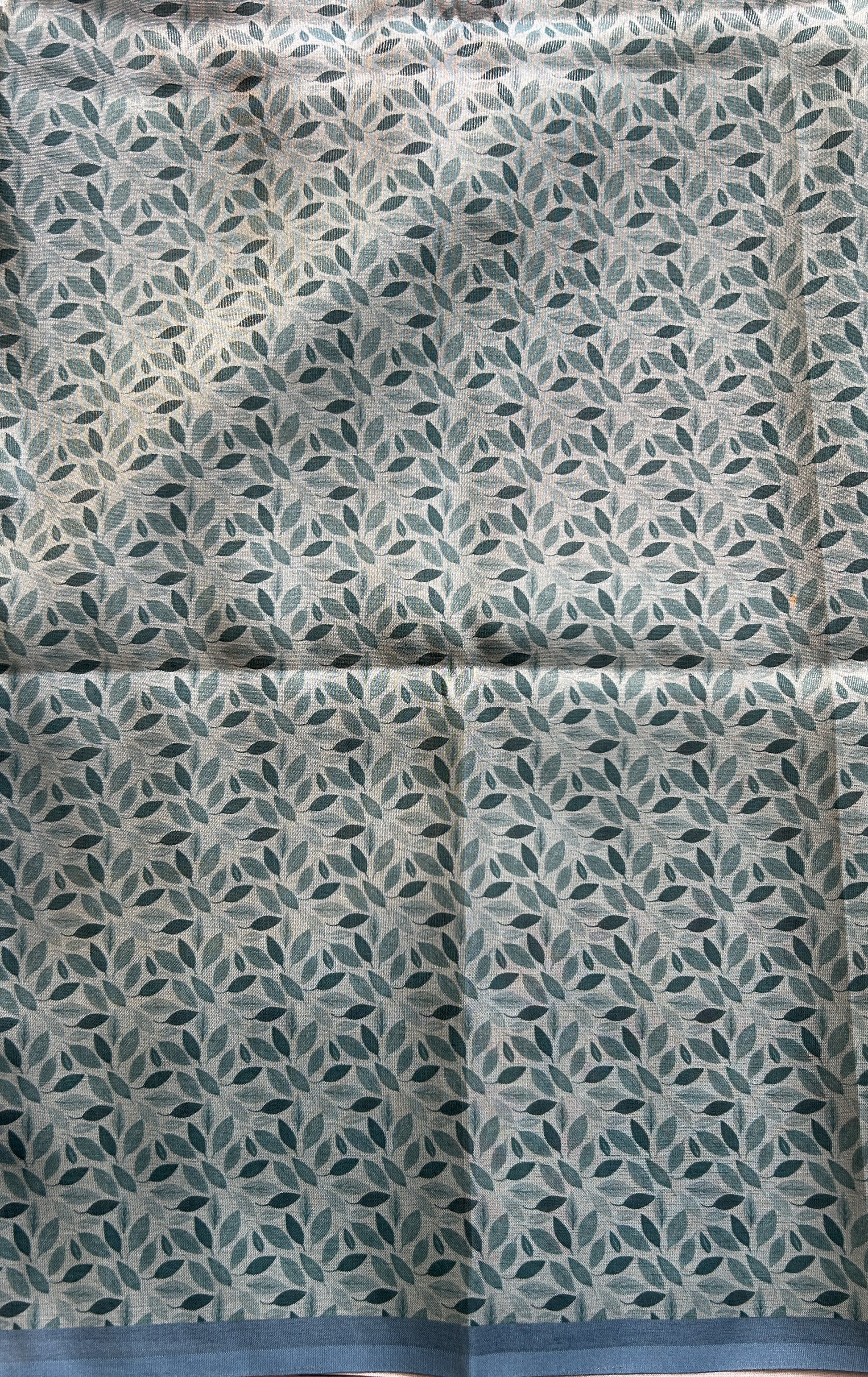 Semi Tussar Saree Sea Blue Colored complemented with a Zari Border. - Sampradaya Designer Studio