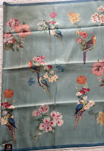 Semi Tussar Saree Sea Blue Colored complemented with a Zari Border. - Sampradaya Designer Studio