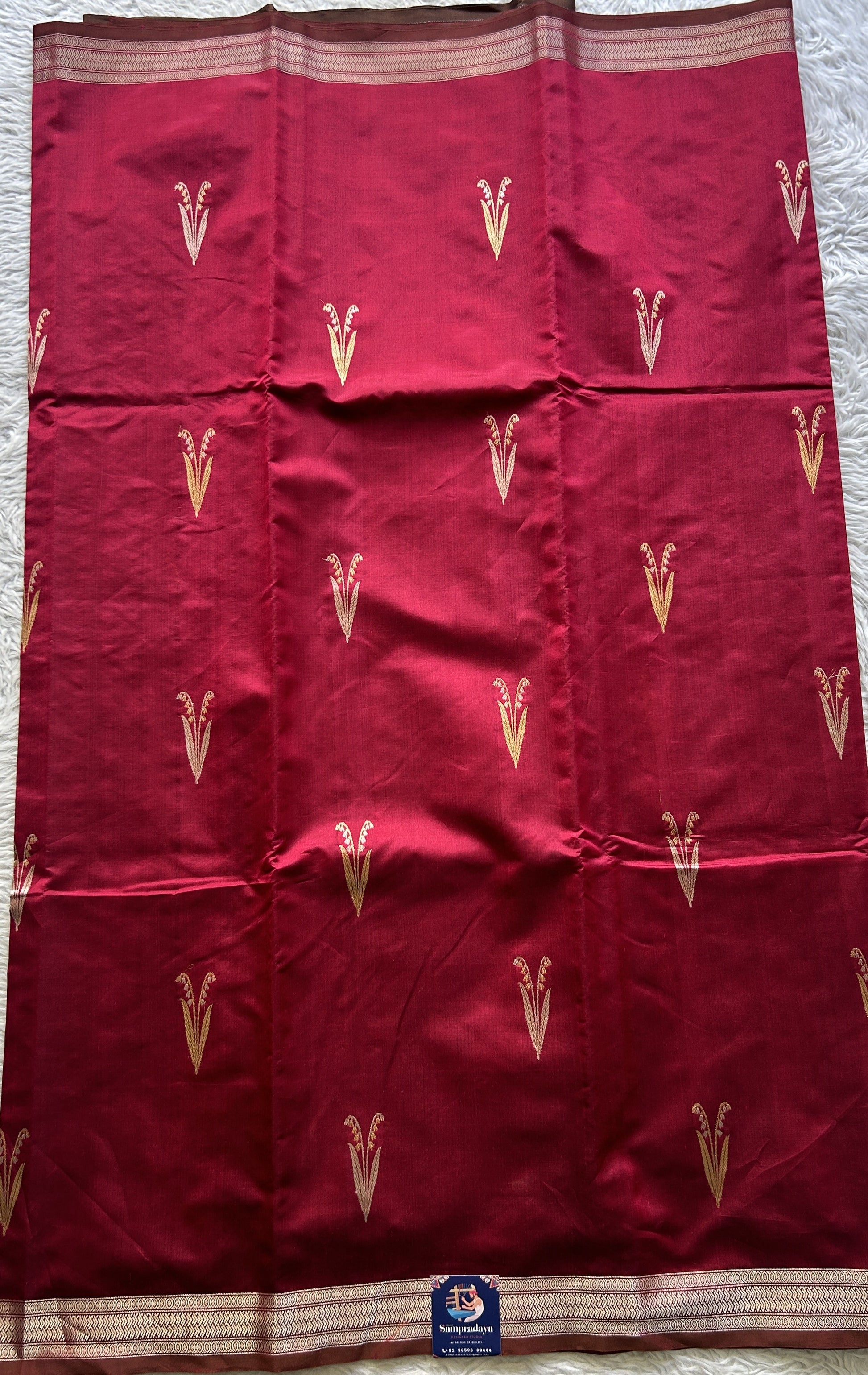 Banarasi Katan Silk Saree Magenta Colored Elegantly Paired with a Zari border. - Sampradaya Designer Studio