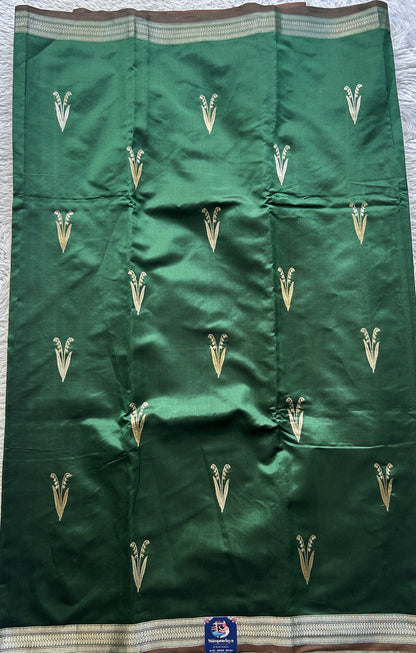 Banarasi Katan Silk Saree Green Colored Elegantly Paired with a Zari border. - Sampradaya Designer Studio