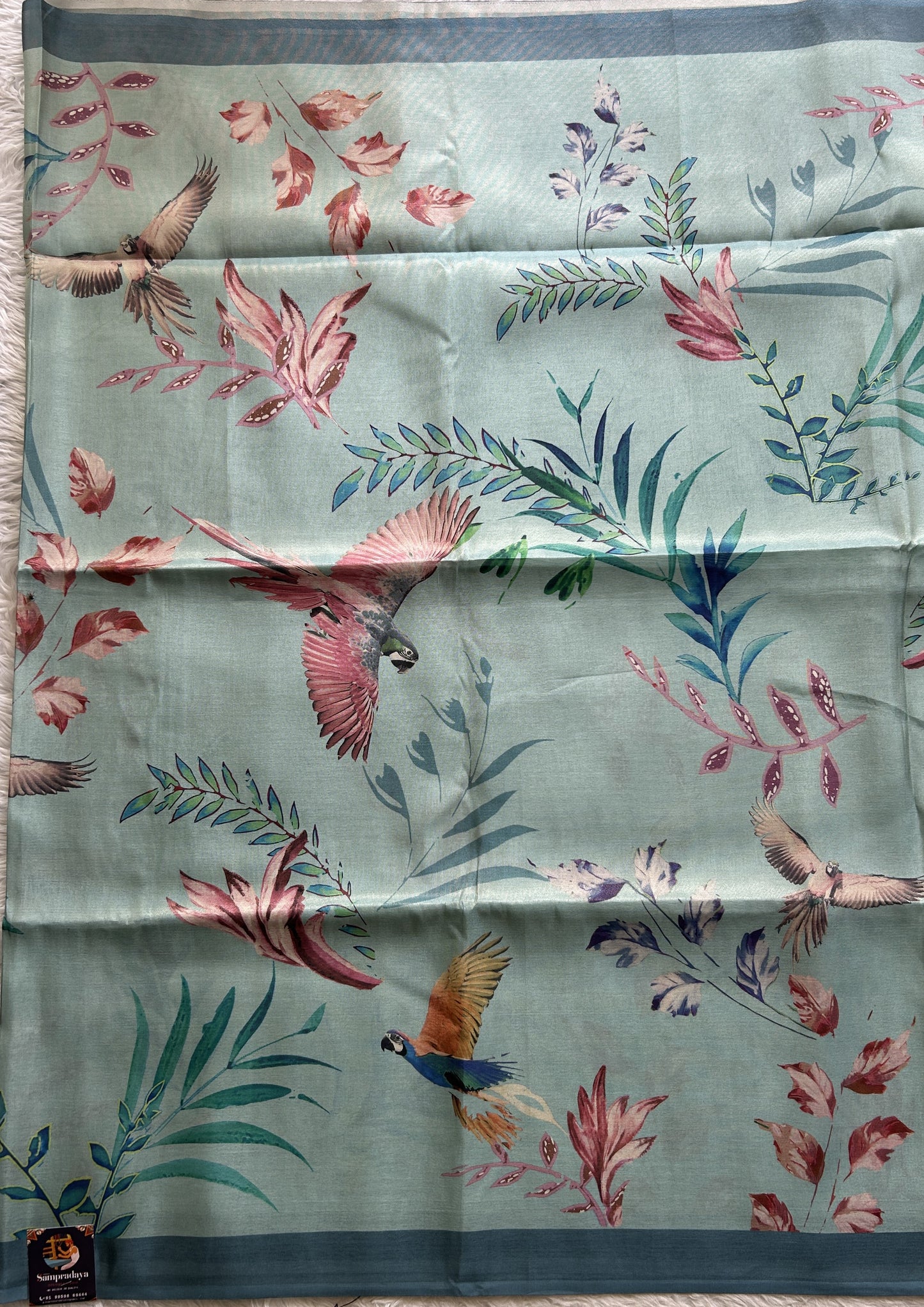 Semi Tussar Saree Sky Blue Colored complemented with a Zari Border. - Sampradaya Designer Studio
