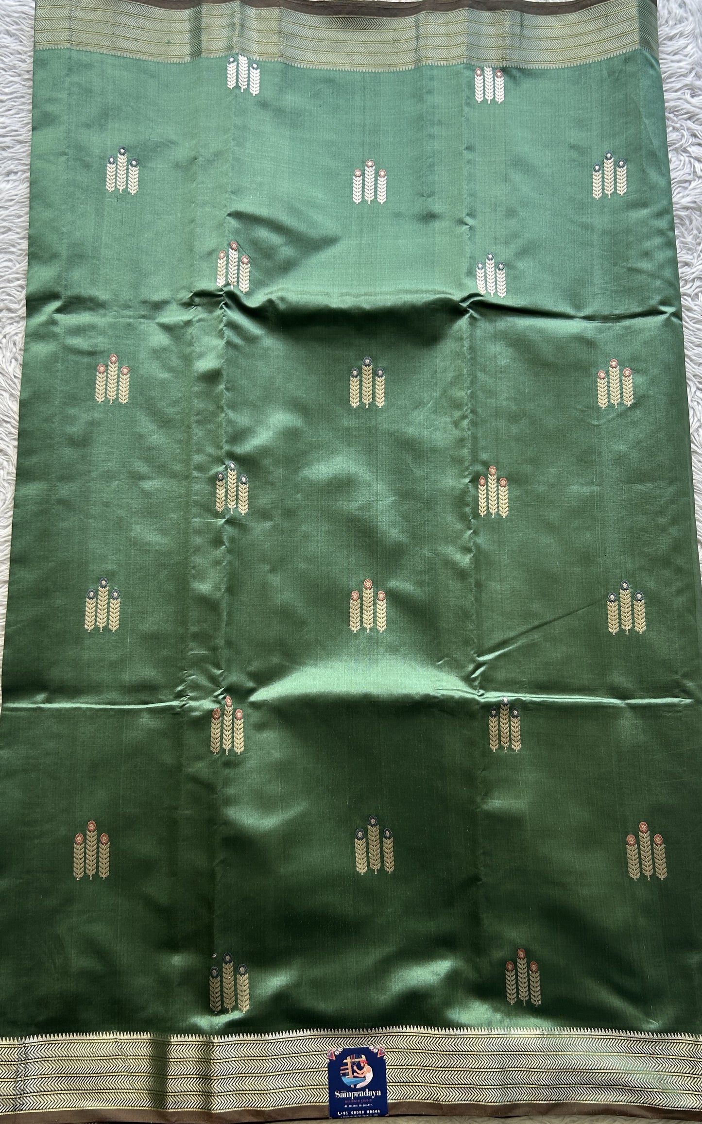 Banarasi Katan Silk Saree Sea Green Colored Elegantly Paired with a Zari border. - Sampradaya Designer Studio