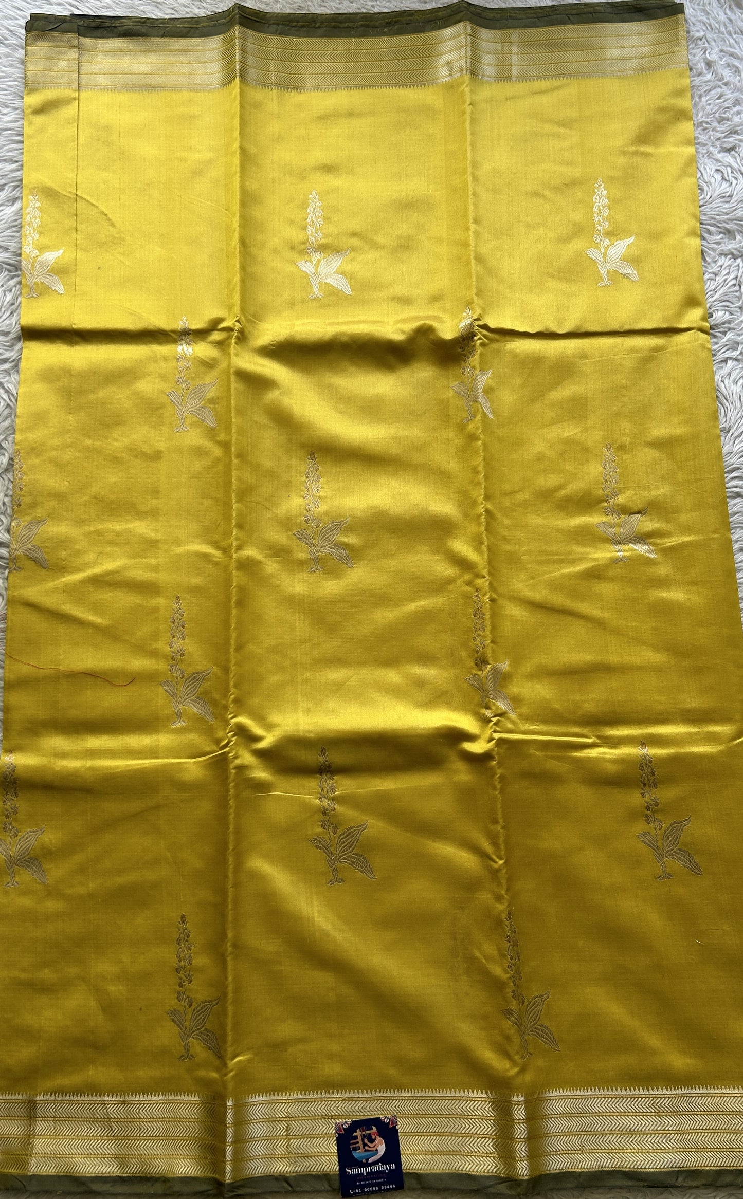 Banarasi Katan Silk Saree Canary Colored Elegantly Paired with a Zari border. - Sampradaya Designer Studio
