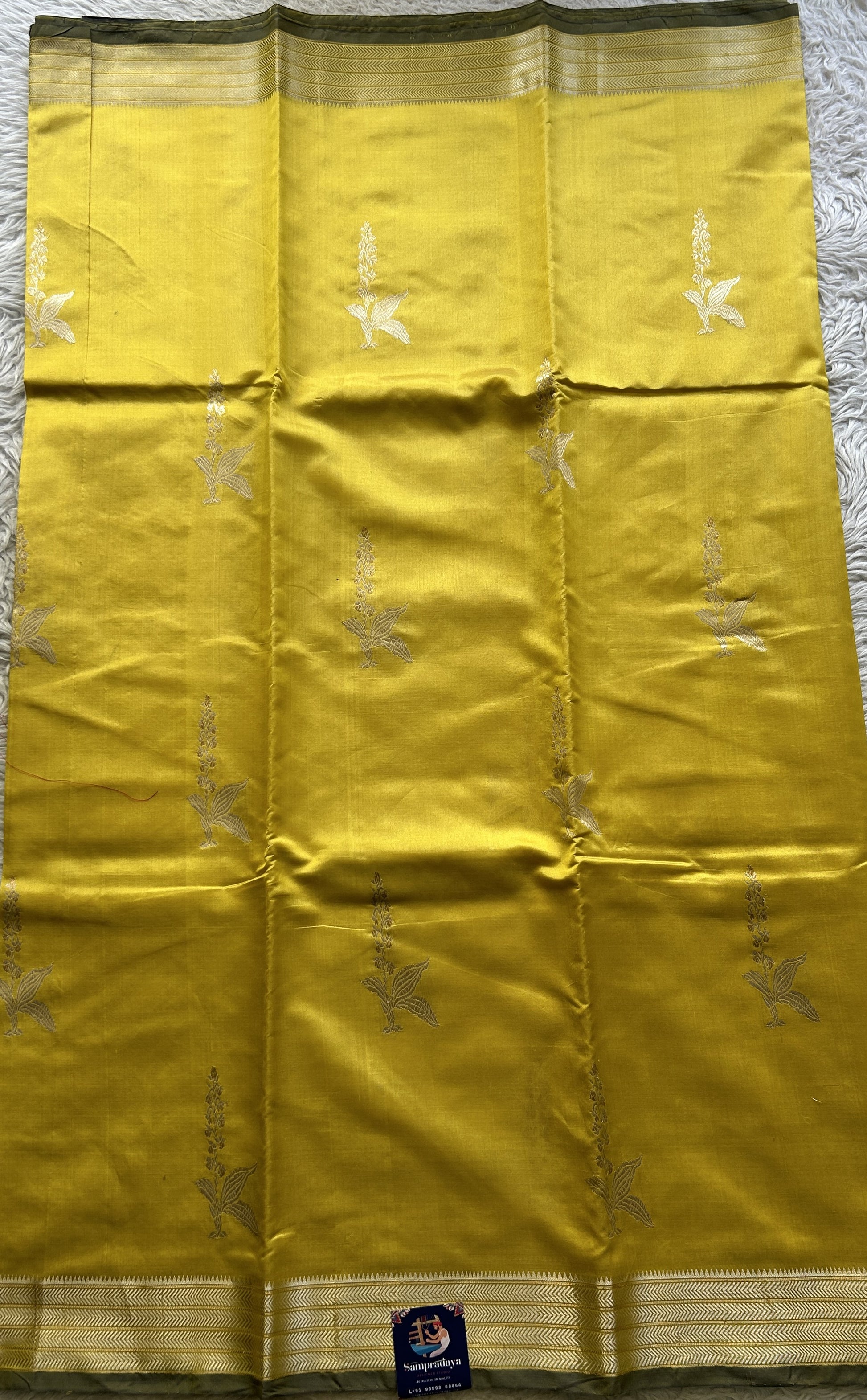 Banarasi Katan Silk Saree Canary Colored Elegantly Paired with a Zari border. - Sampradaya Designer Studio
