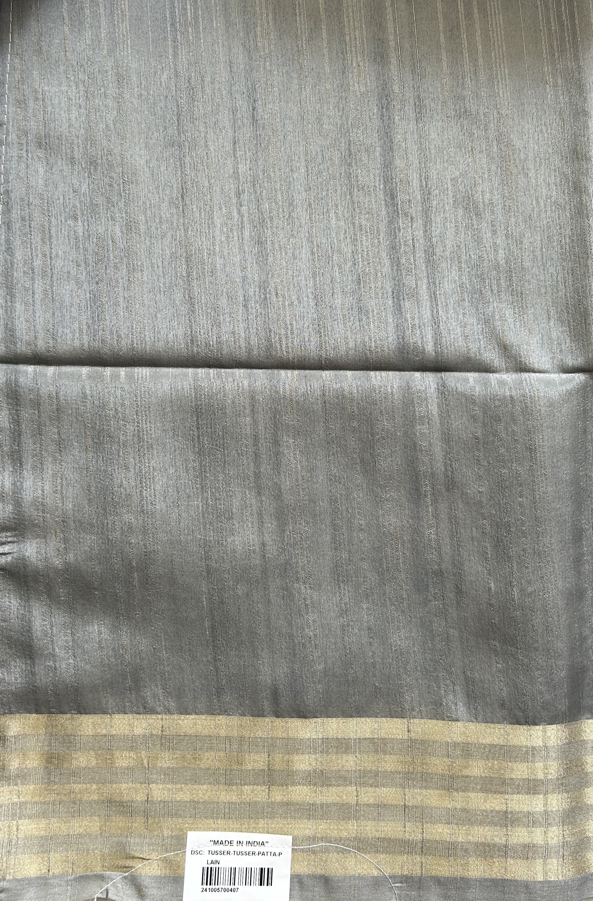 Semi Tussar Saree Bottle Green Colored complemented with a Gray Color Zari Border. - Sampradaya Designer Studio