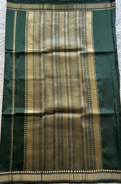 Banarasi Katan Silk Saree Dark Green Colored Elegantly Paired with a Zari border. - Sampradaya Designer Studio