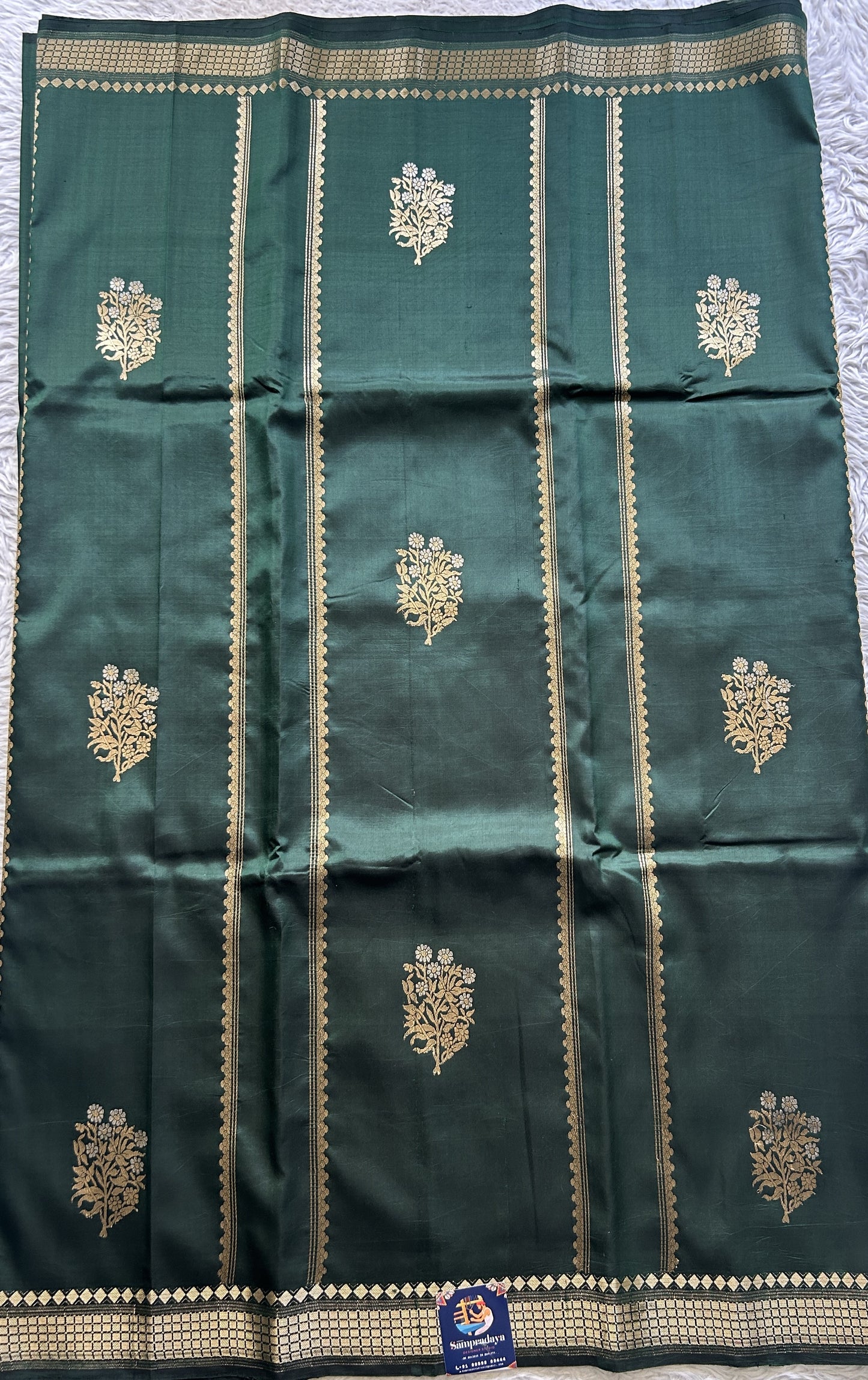 Banarasi Katan Silk Saree Dark Green Colored Elegantly Paired with a Zari border. - Sampradaya Designer Studio
