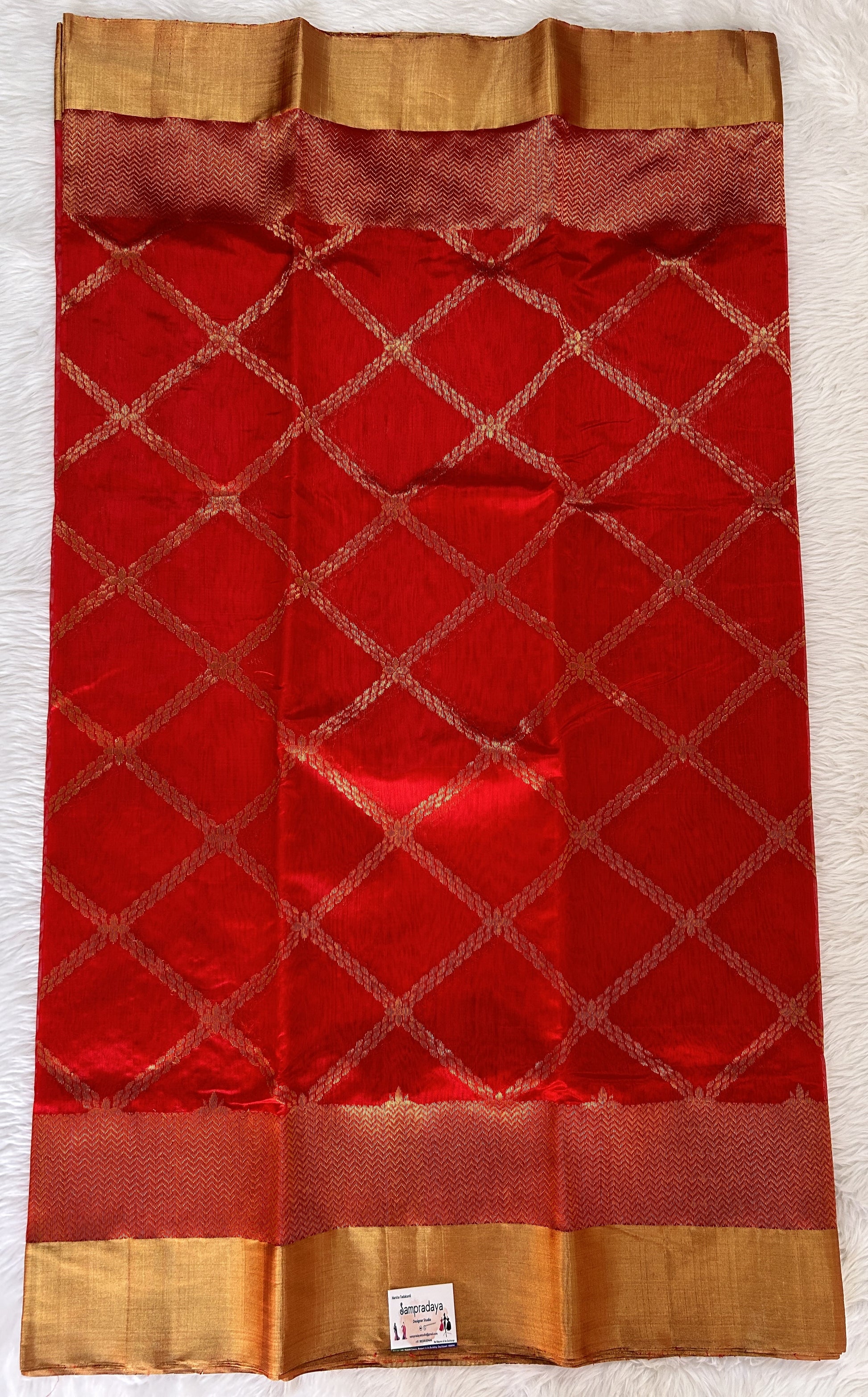 Chanderi Pattu Saree Red colored saree complemented with a Gold Zari Border - Sampradaya Designer Studio