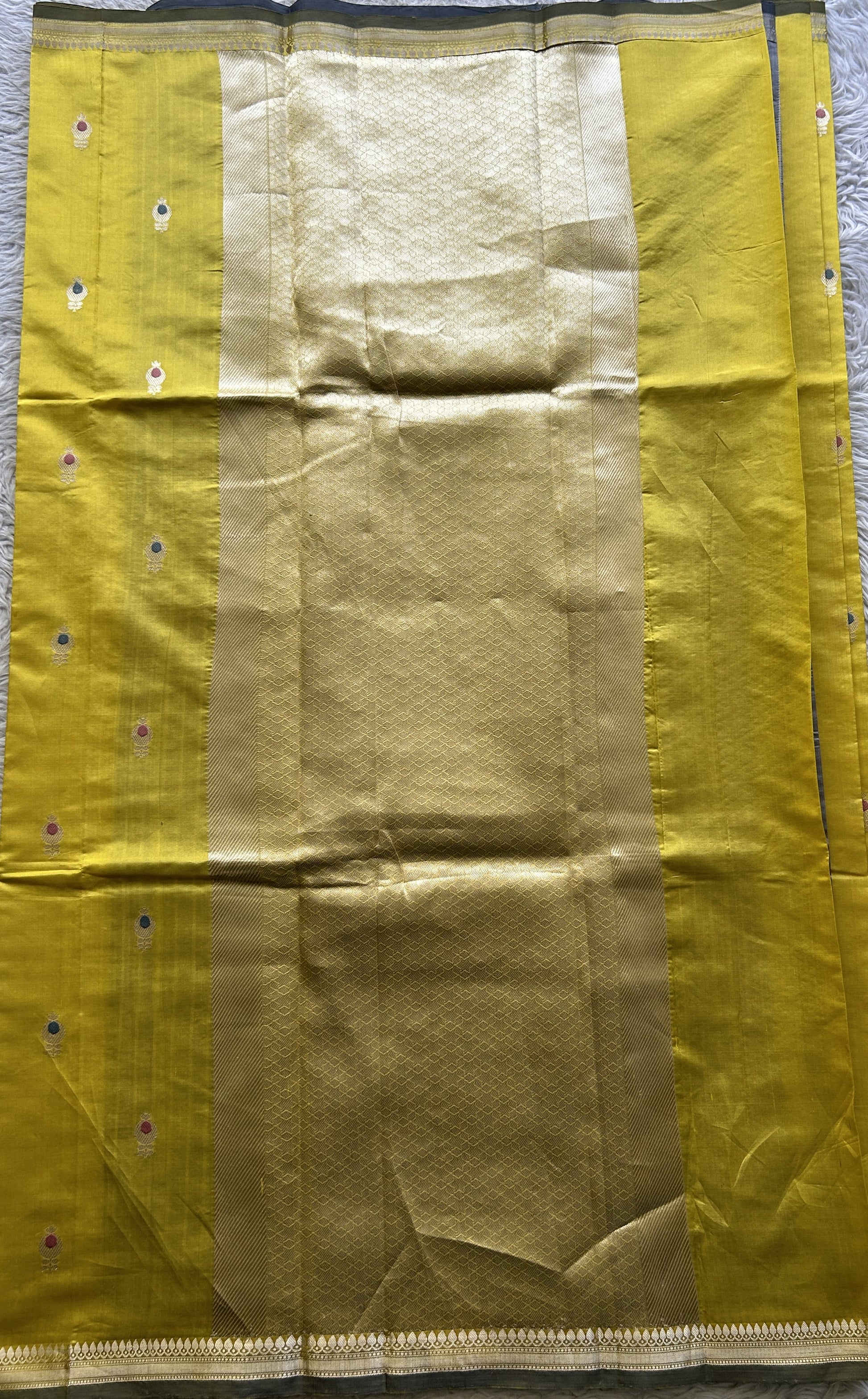 Banarasi Katan Silk Saree Yellow Colored Elegantly Paired with a Zari border. - Sampradaya Designer Studio