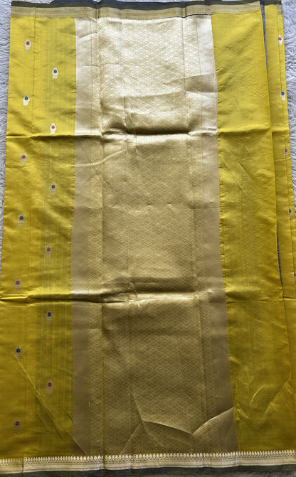 Banarasi Katan Silk Saree Yellow Colored Elegantly Paired with a Zari border. - Sampradaya Designer Studio