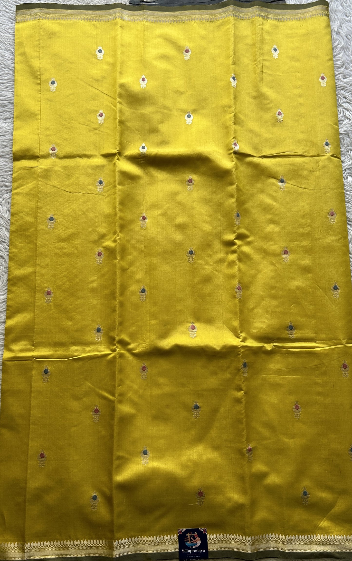 Banarasi Katan Silk Saree Yellow Colored Elegantly Paired with a Zari border. - Sampradaya Designer Studio