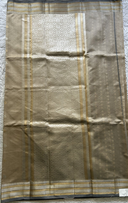 Banarasi Katan Silk Saree Beige Colored Elegantly Paired with a Zari border. - Sampradaya Designer Studio