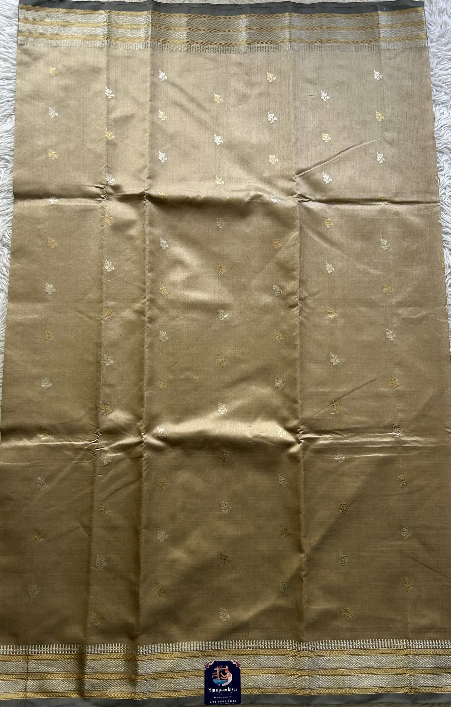 Banarasi Katan Silk Saree Beige Colored Elegantly Paired with a Zari border. - Sampradaya Designer Studio