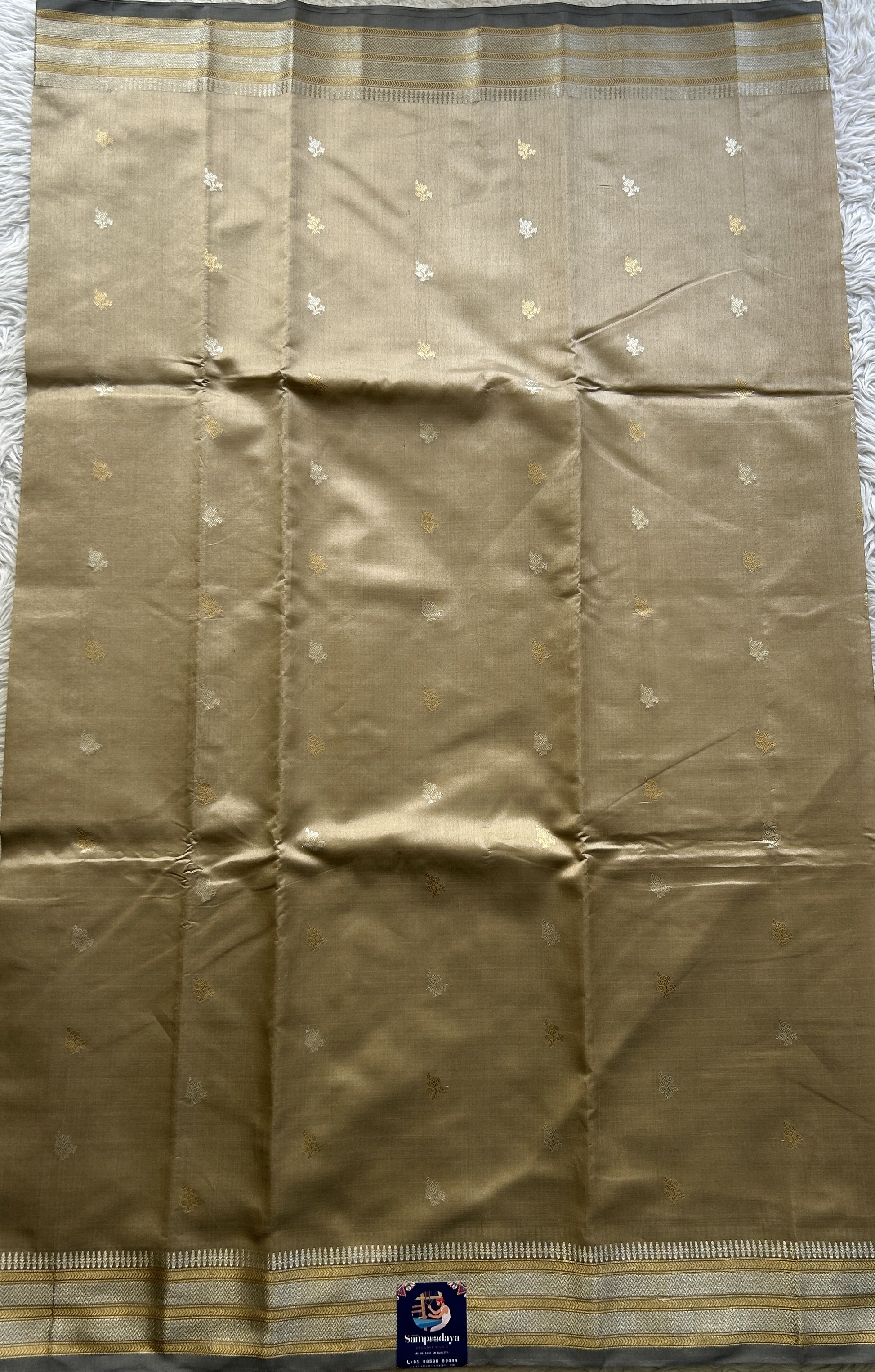 Banarasi Katan Silk Saree Beige Colored Elegantly Paired with a Zari border. - Sampradaya Designer Studio