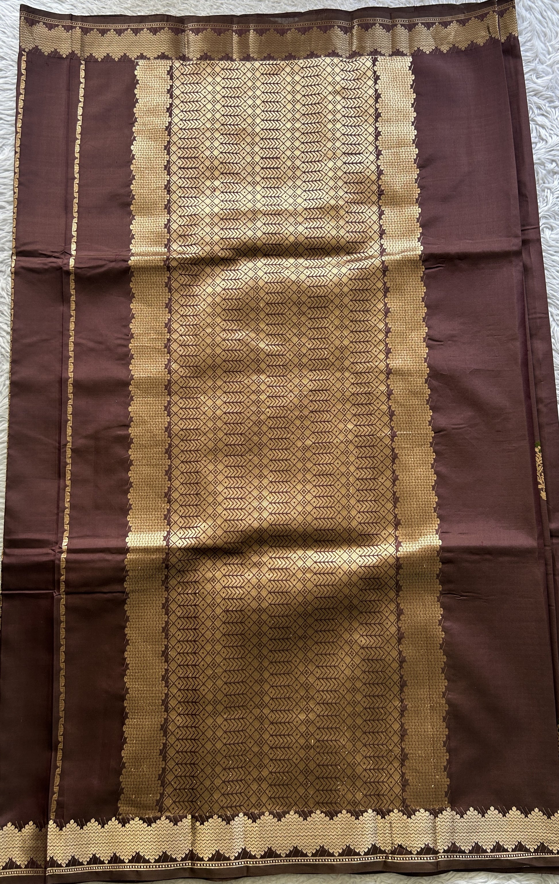 Banarasi Katan Silk Saree Brown Colored Elegantly Paired with a Zari border. - Sampradaya Designer Studio