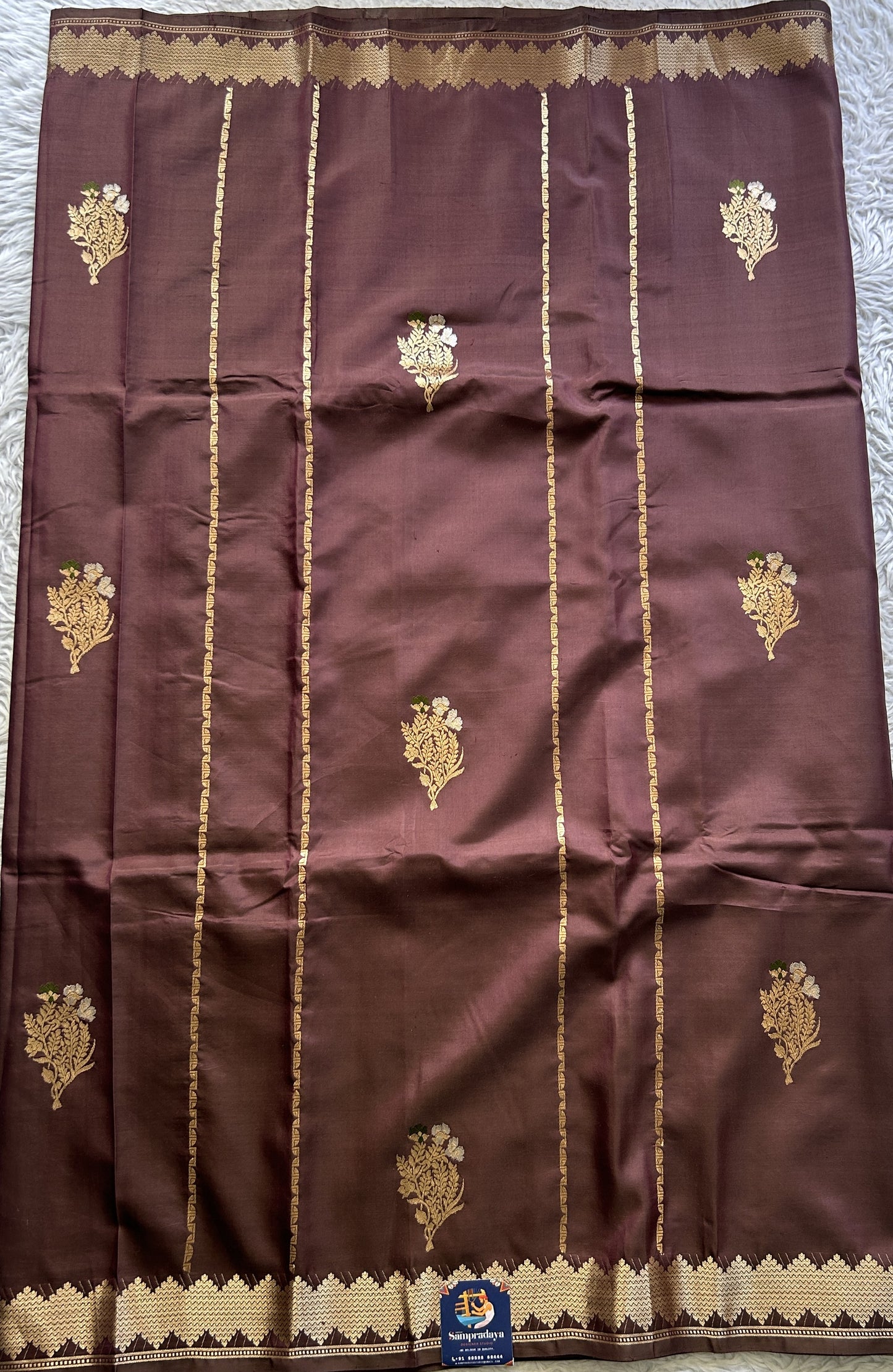 Banarasi Katan Silk Saree Brown Colored Elegantly Paired with a Zari border. - Sampradaya Designer Studio