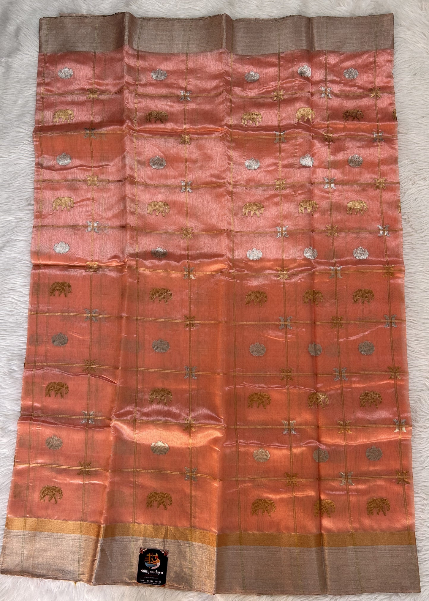 Chanderi Pattu Saree Peach colored saree complemented with a Silver Zari Border - Sampradaya Designer Studio