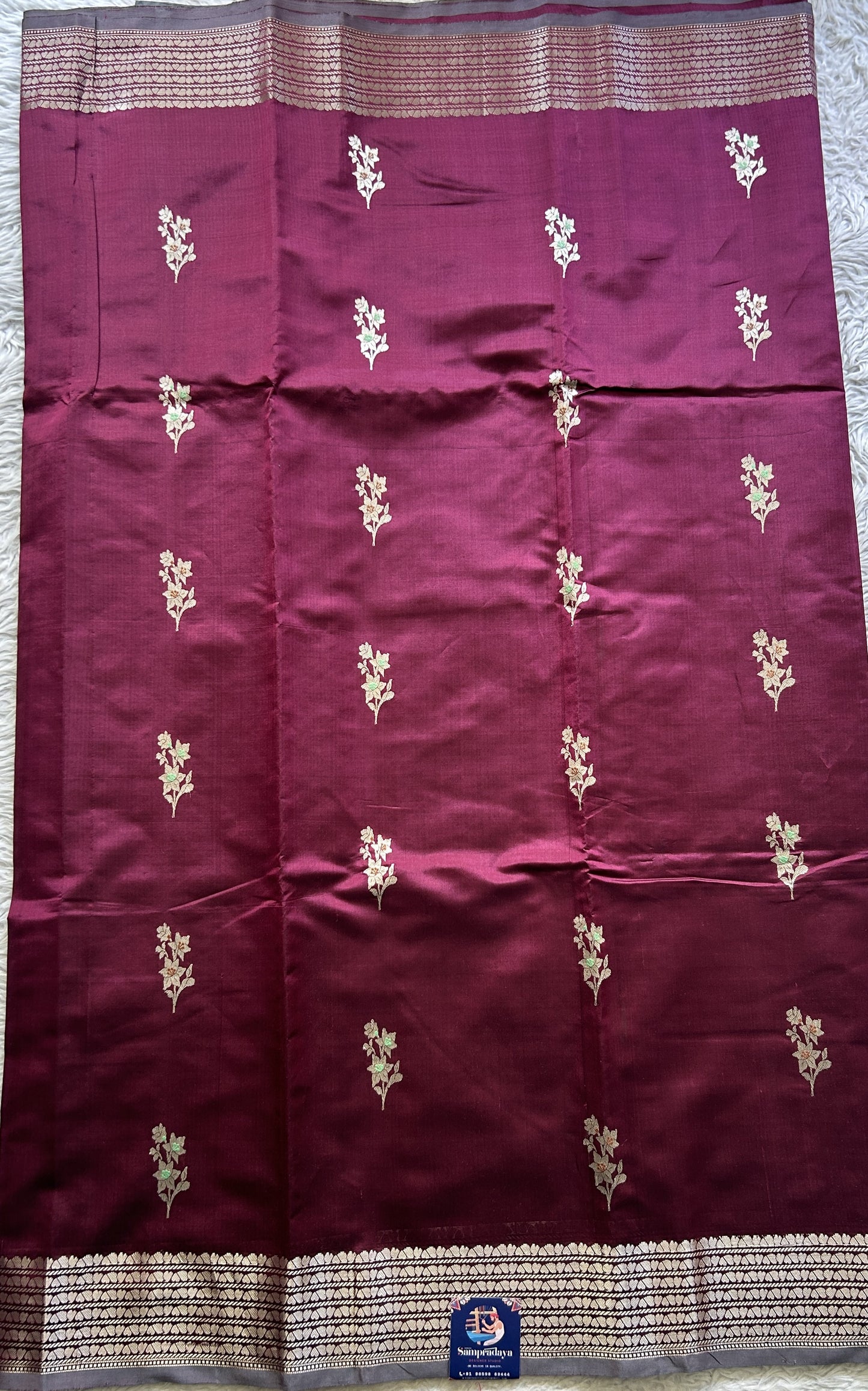 Banarasi Katan Silk Saree Burgundy Colored Elegantly Paired with a Zari border. - Sampradaya Designer Studio