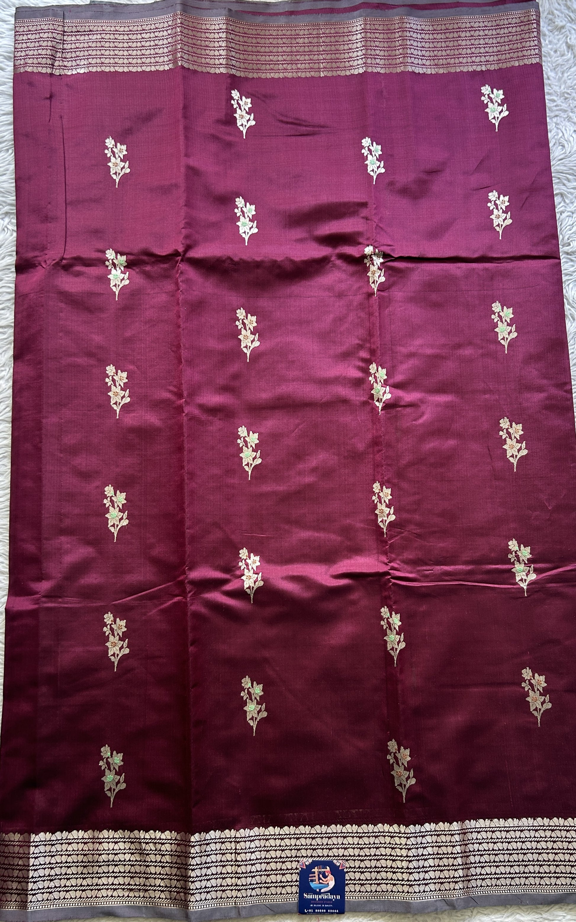Banarasi Katan Silk Saree Burgundy Colored Elegantly Paired with a Zari border. - Sampradaya Designer Studio