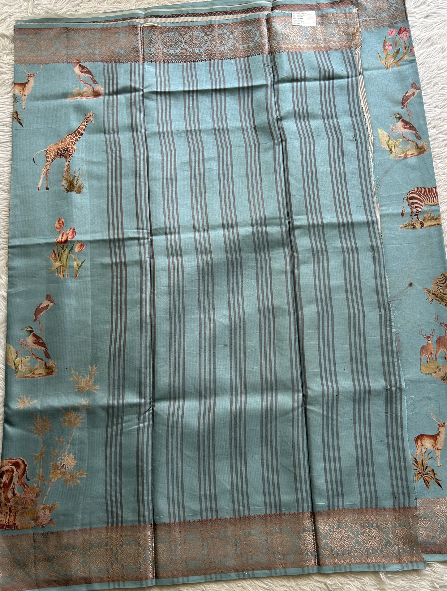 Semi Raw Silk Saree Sky Blue Colored Complemented with a Zari Border. - Sampradaya Designer Studio