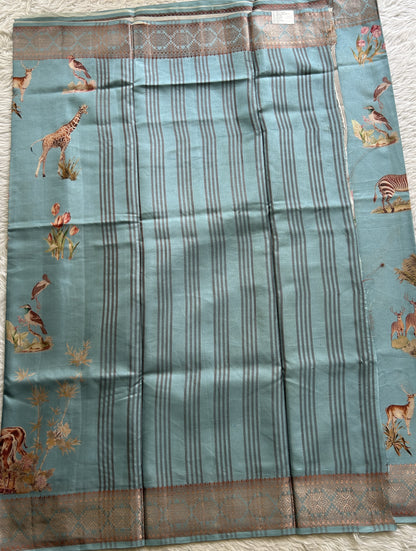 Semi Raw Silk Saree Sky Blue Colored Complemented with a Zari Border. - Sampradaya Designer Studio