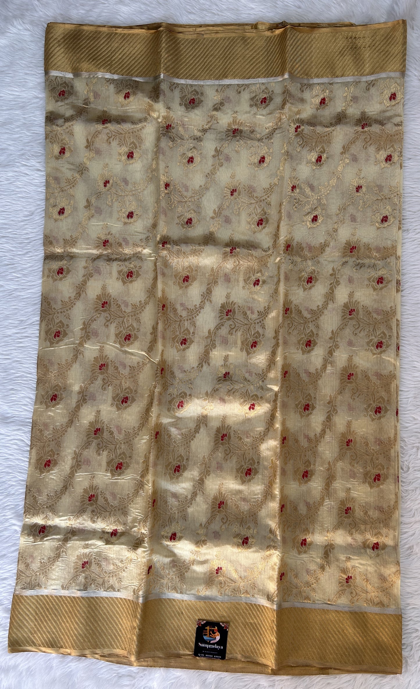 Chanderi Pattu Saree Cream colored saree complemented with a Gold Zari Border - Sampradaya Designer Studio