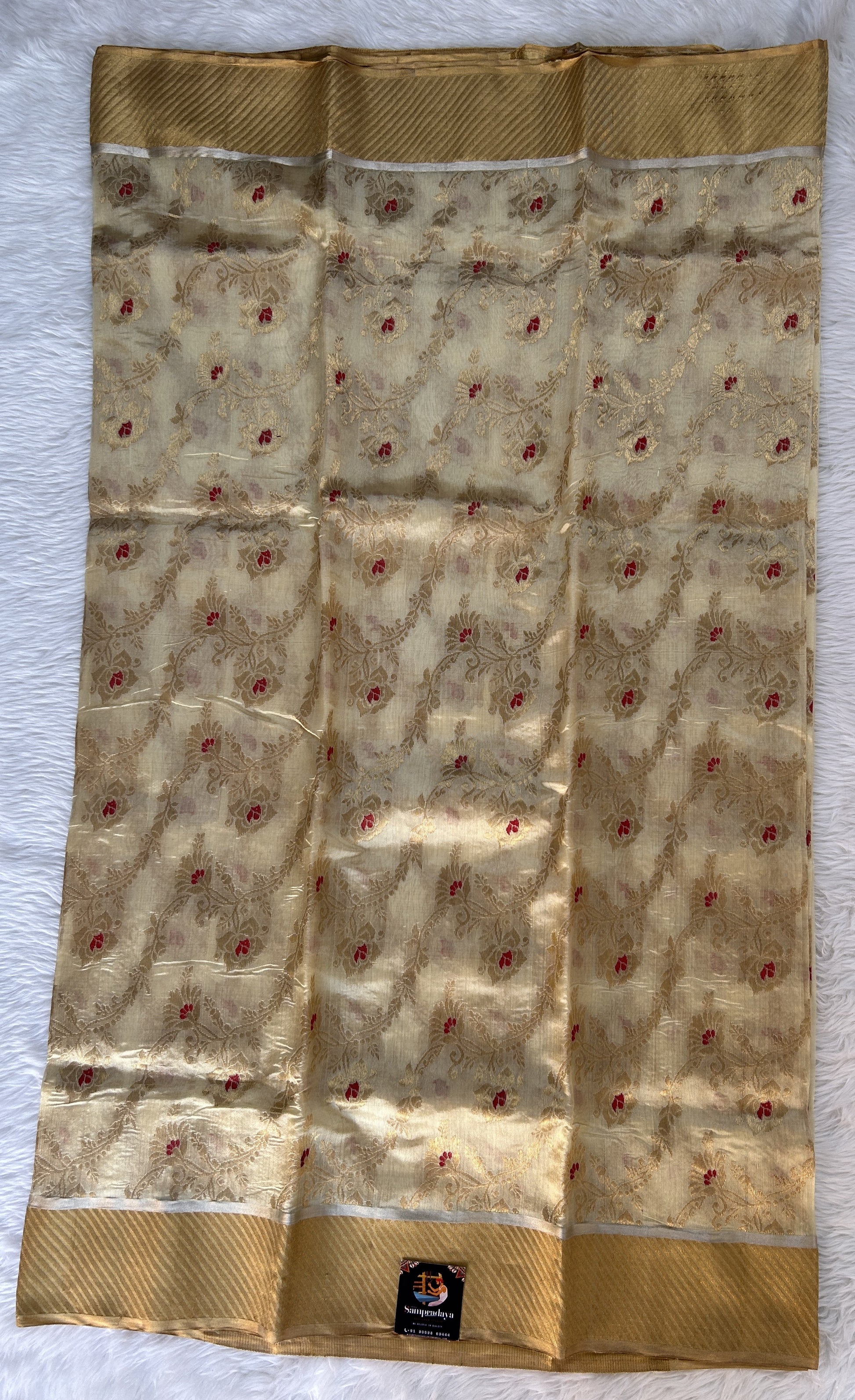 Chanderi Pattu Saree Cream colored saree complemented with a Gold Zari Border - Sampradaya Designer Studio