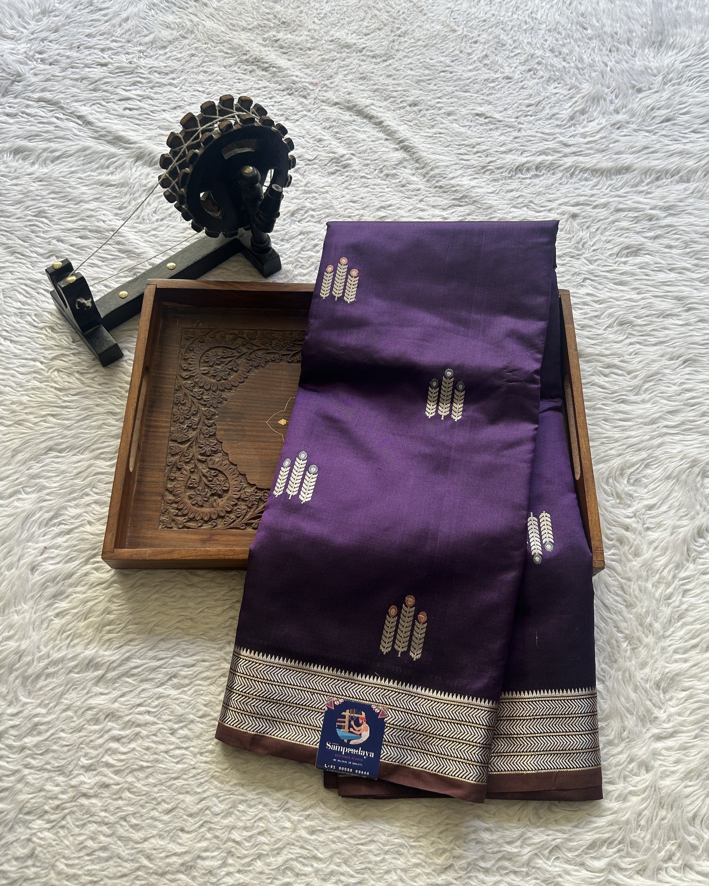 Banarasi Katan Silk Saree Brinjal Colored Elegantly Paired with a Zari border. - Sampradaya Designer Studio