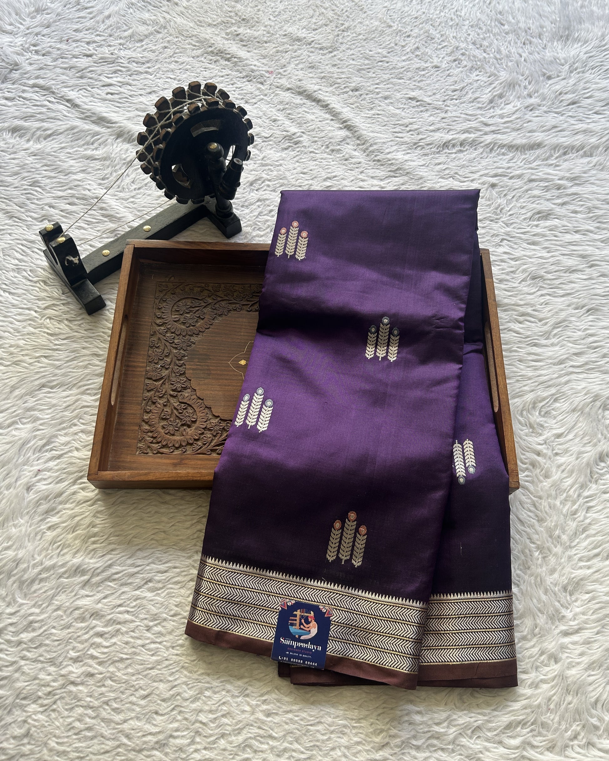 Banarasi Katan Silk Saree Brinjal Colored Elegantly Paired with a Zari border. - Sampradaya Designer Studio