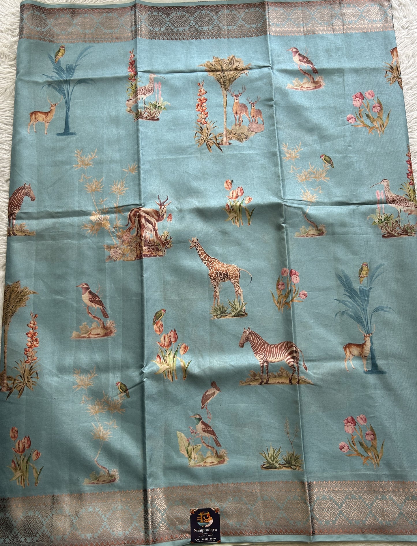 Semi Raw Silk Saree Sky Blue Colored Complemented with a Zari Border. - Sampradaya Designer Studio