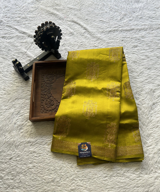 Chiniya Silk Saree Yellow Colored Elegantly Paired with a Zari Border. - Sampradaya Designer Studio