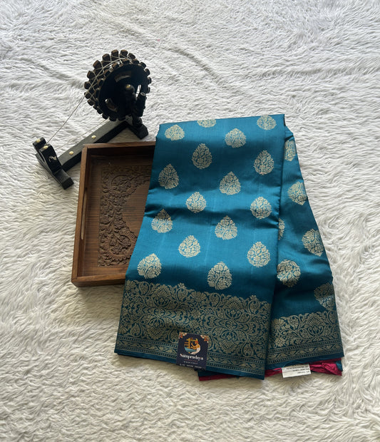 Chiniya Silk Saree German Blue Colored Elegantly Paired with a Zari Border. - Sampradaya Designer Studio