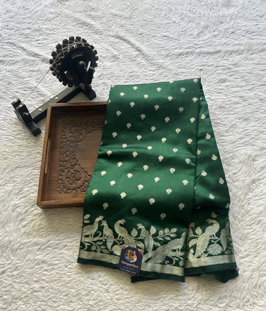 Chiniya Silk Saree Dark Green Colored Elegantly Paired with a Jal Border. - Sampradaya Designer Studio