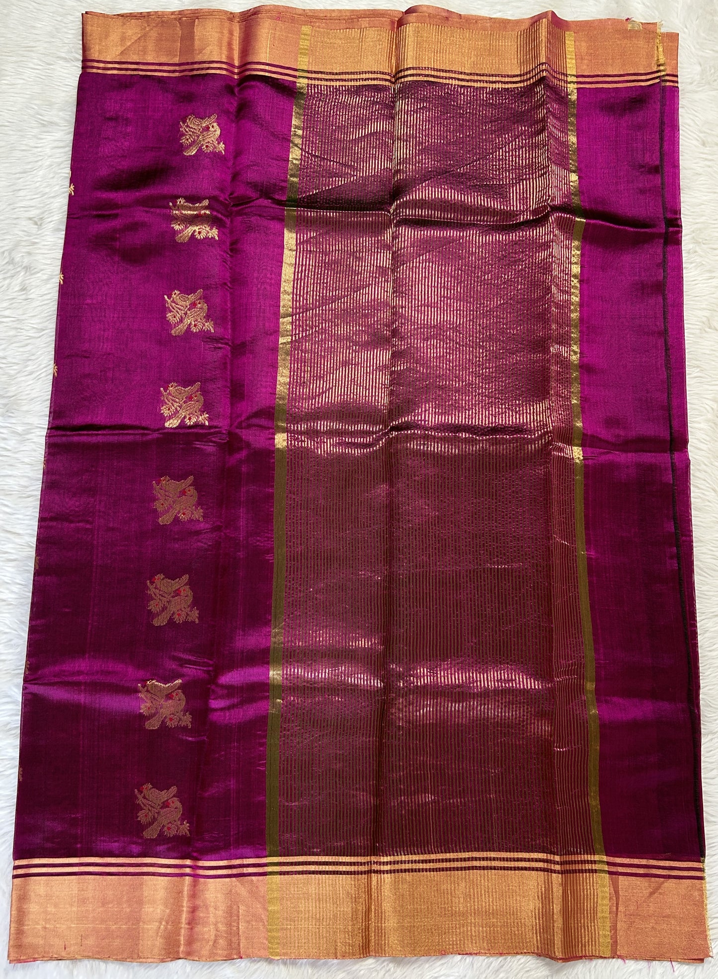 Chanderi Pattu Saree Magenta colored saree complemented with a Gold Zari border - Sampradaya Designer Studio