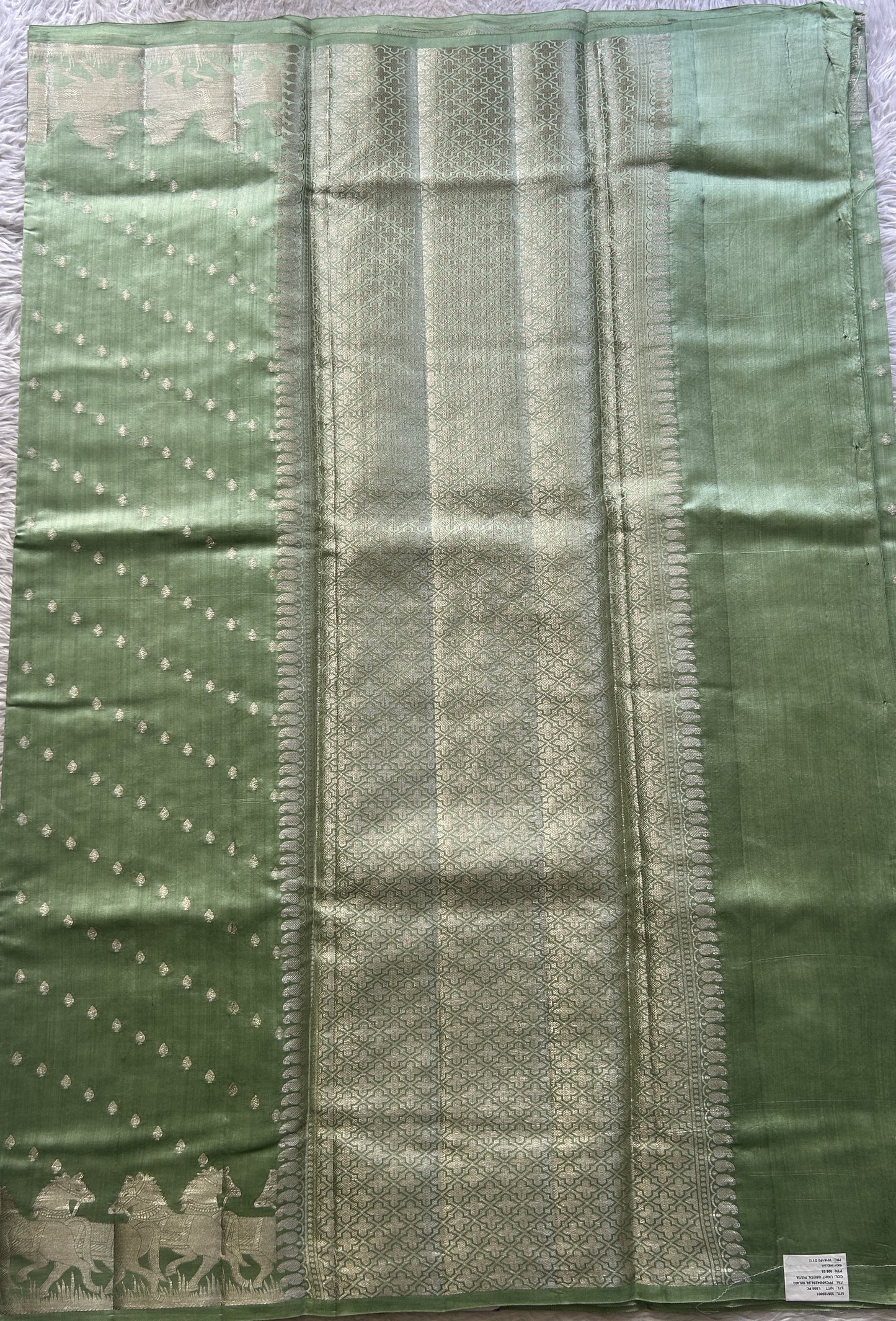Chiniya Silk Saree Light Green Colored Elegantly Paired with a Zari Border. - Sampradaya Designer Studio