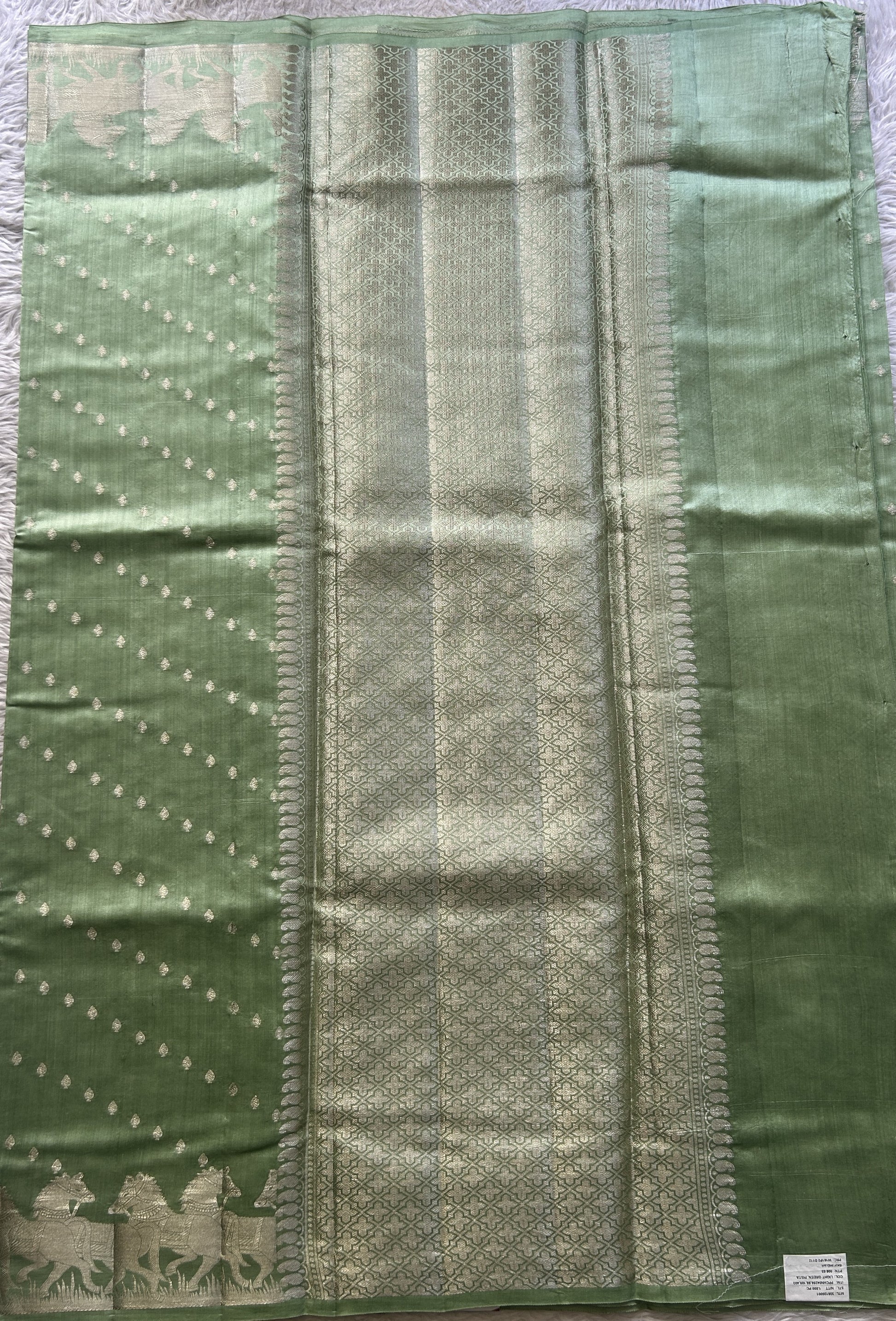 Chiniya Silk Saree Light Green Colored Elegantly Paired with a Zari Border. - Sampradaya Designer Studio