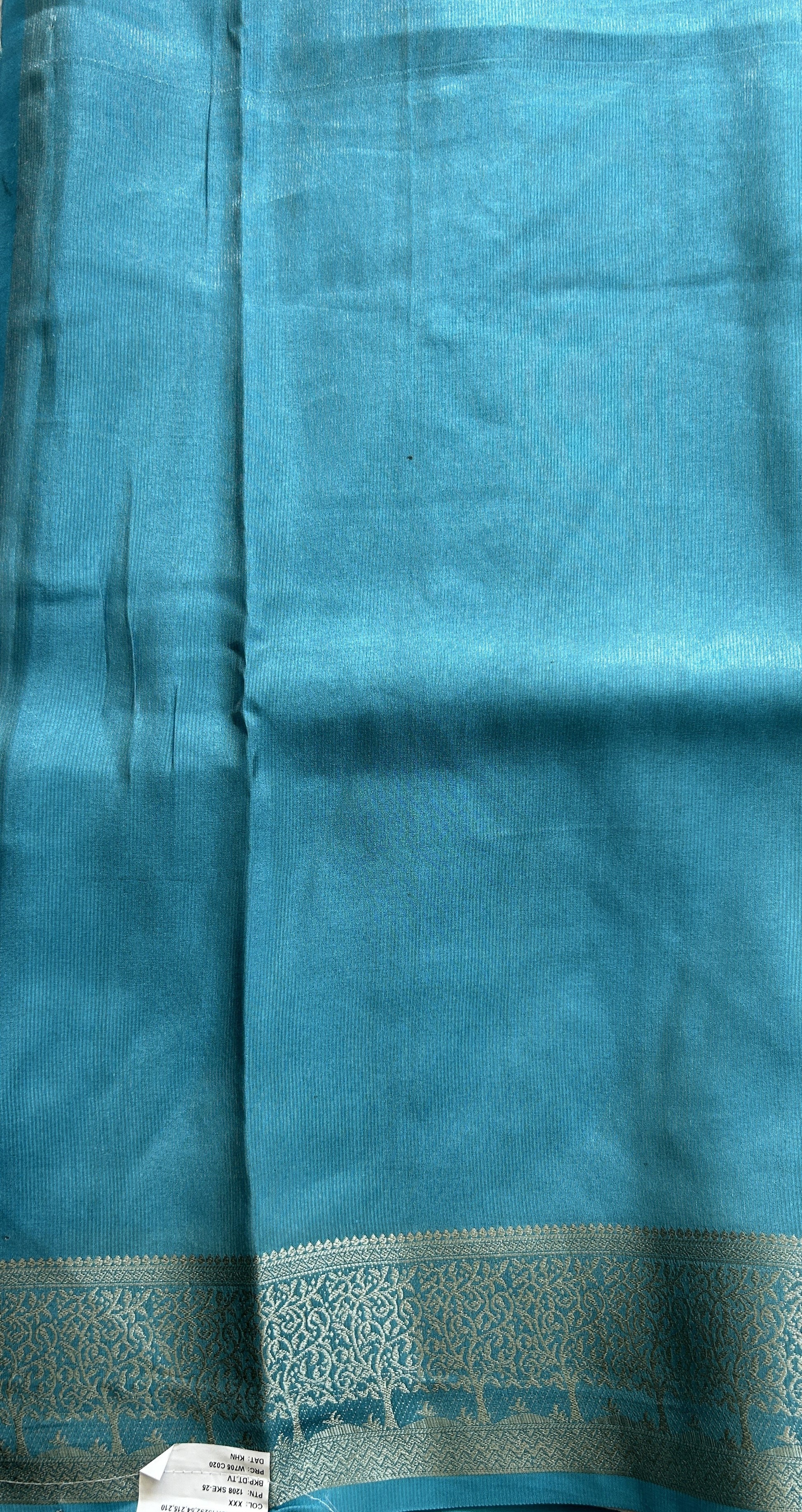 Semi Raw Silk Saree Teal Blue Colored Complemented with a Zari Border. - Sampradaya Designer Studio